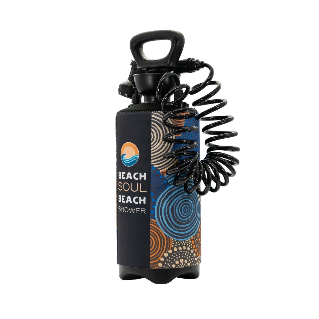 Side view of the Jamigam 8L portable shower with Indigenous artwork sleeve